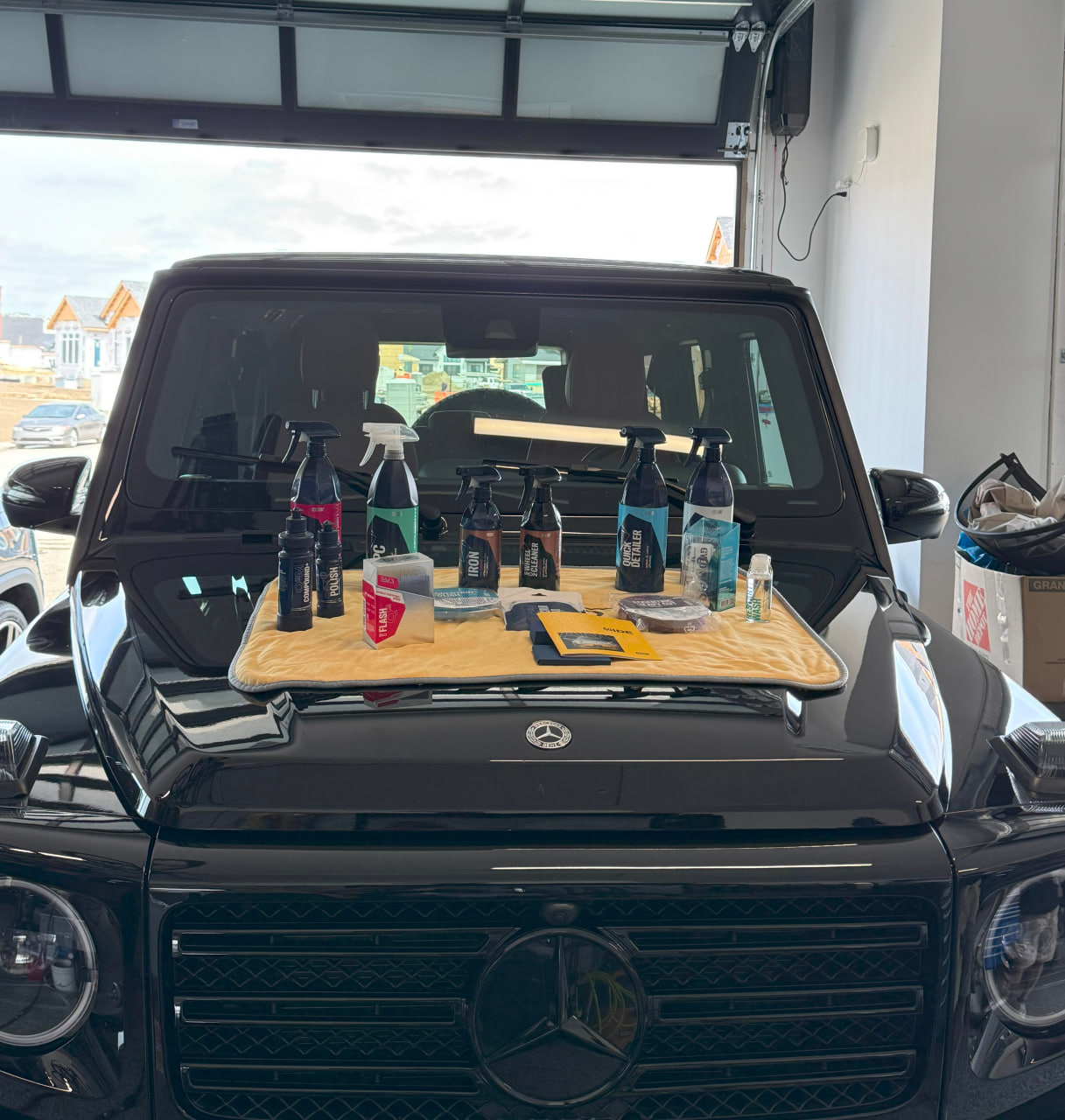 Professional car detailer at work